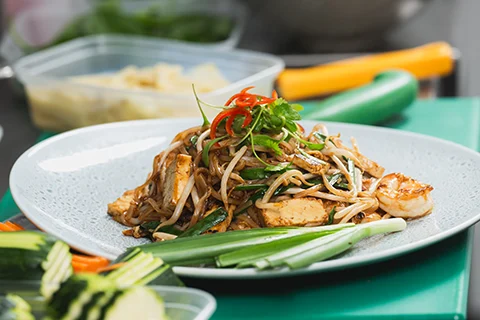 pad thai in a chefs kitchen